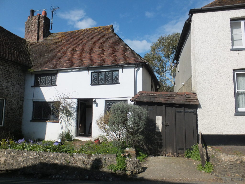 Cottage front elevation before works