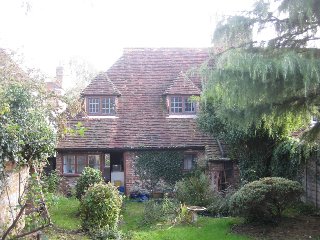 Cottage rear elevation before works